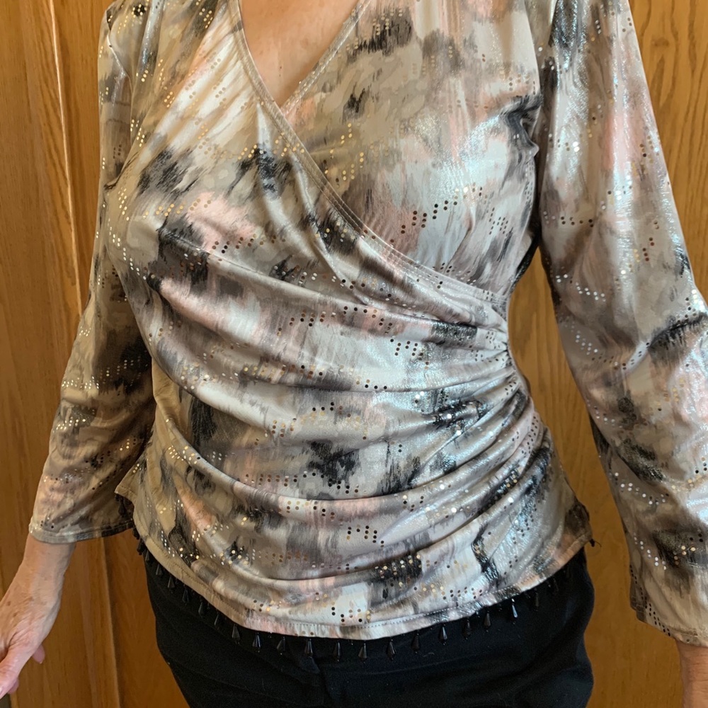 Classy shimmery blouse for many occasions.